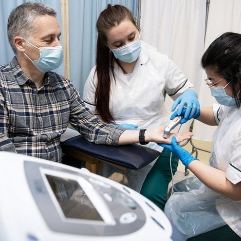 This is a picture of a patient receiving a treatment at Cambridge University Hospitals